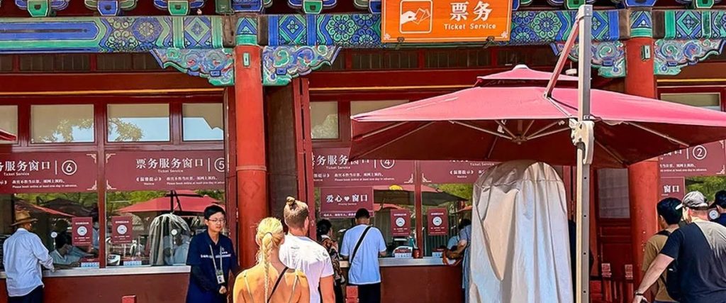 The ticket service window is easily identifiable for international visitors.