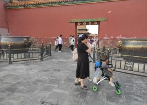 Visitors visit the Hall of Central Harmony