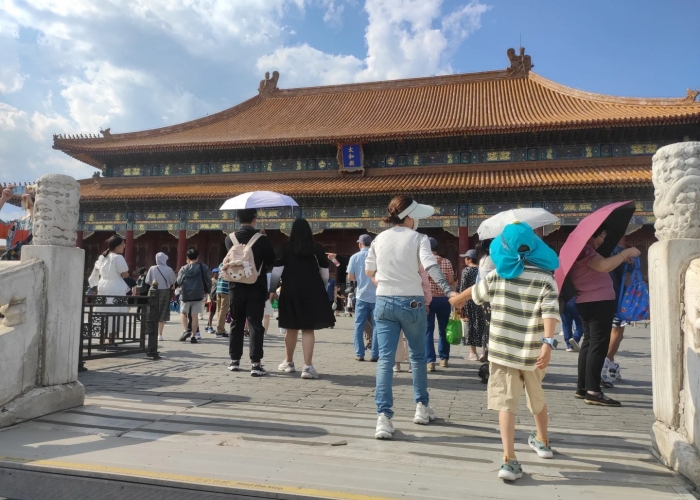 Visitors visit the Hall of Central Harmony